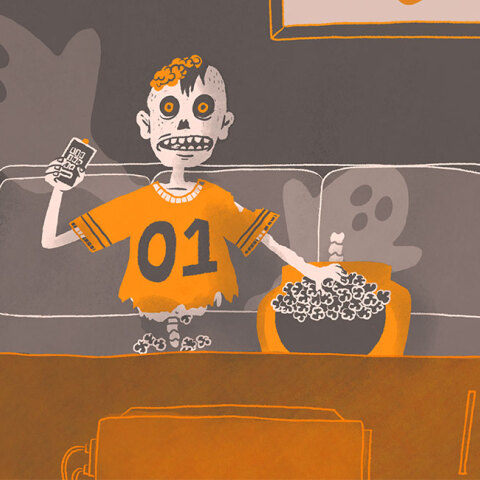 Ζόμπι στον καναπέ, τρώει ποπ κορν και βλέπει τηλεόραση