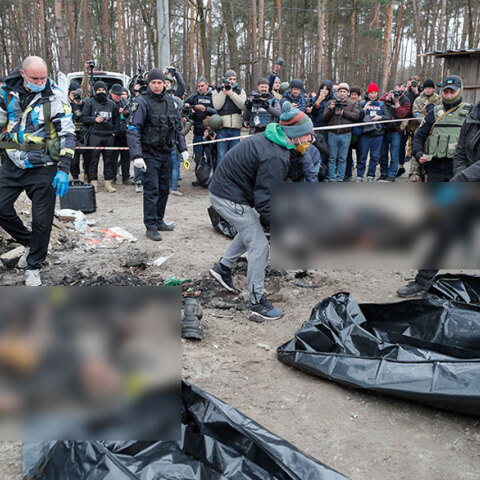 Στην Μπούχα της Ουκρανίας απανθρακωμένα πτώματα αμάχων τοποθετούνται σε μαύρες σακούλες