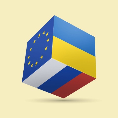 Κύβος με τις σημαίες της Ευρωπαϊκής Ένωσης, της Ρωσίας και της Ουκρανίας