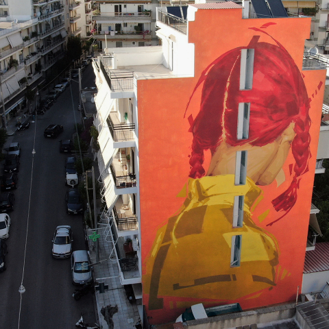 H τοιχογραφία του Γιάννη Βαλυράκη στην Πάτρα με τίτλο «Alice, justice is not blind»