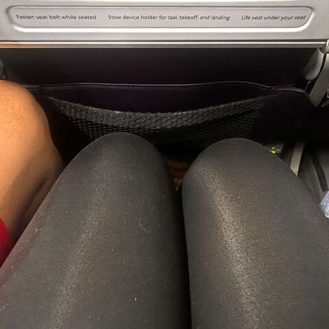 manspreading-on-plane-1-032726-e3fce996591a4ebdaae4b8beb69c5637