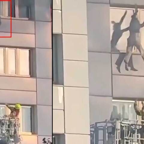 Γυναίκα στο Βερολίνο ετοιμάζεται να πηδήξει στο κενό για να σωθεί από τη φωτιά
