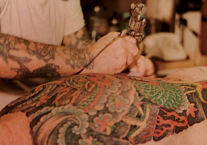 norman-collins-tattooing-back_0.jpg