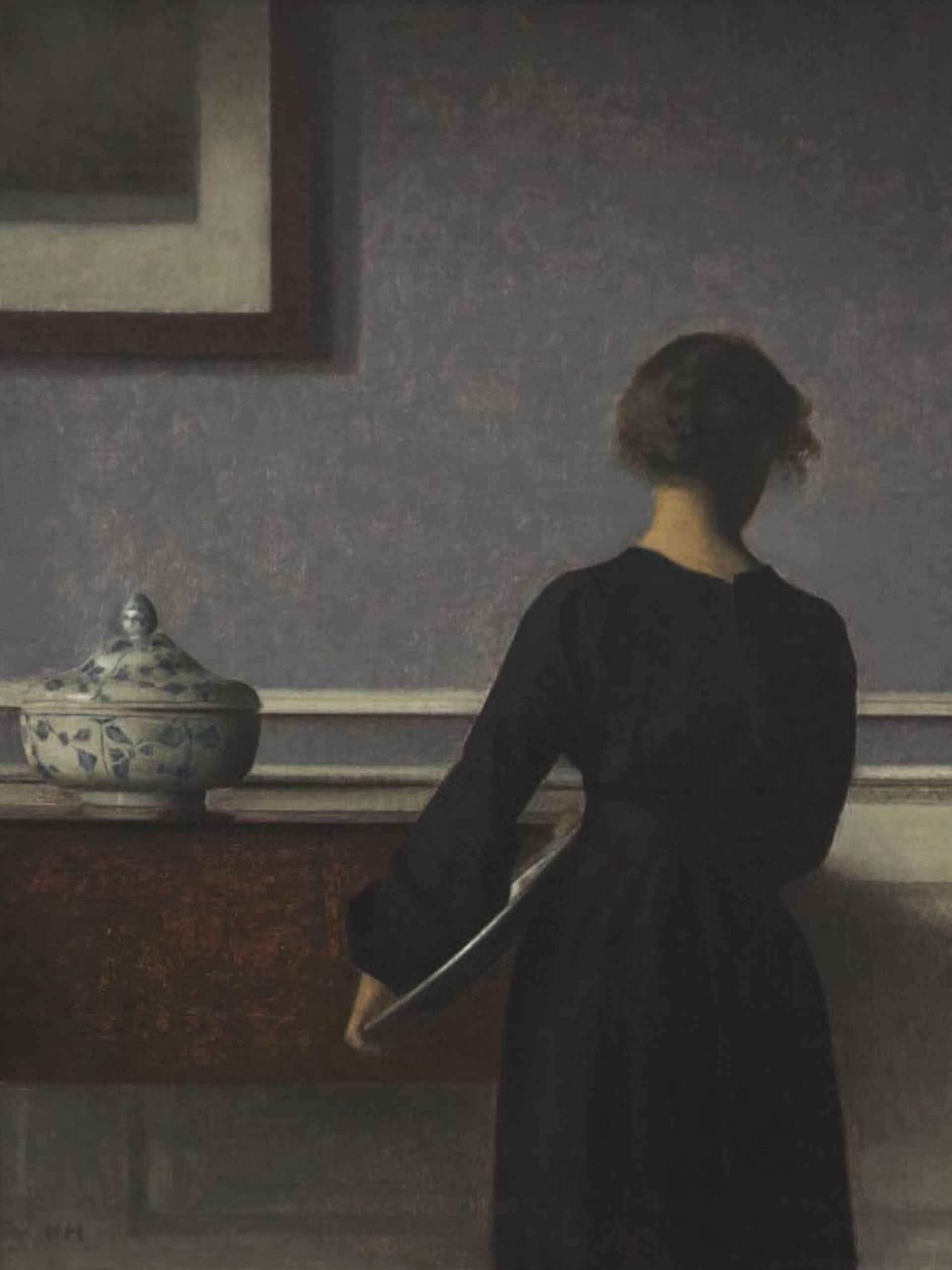 Βίλχελμ Χάμερσoϊ, Εσωτερικό με νεαρή γυναίκα που φαίνεται από την πλάτη 