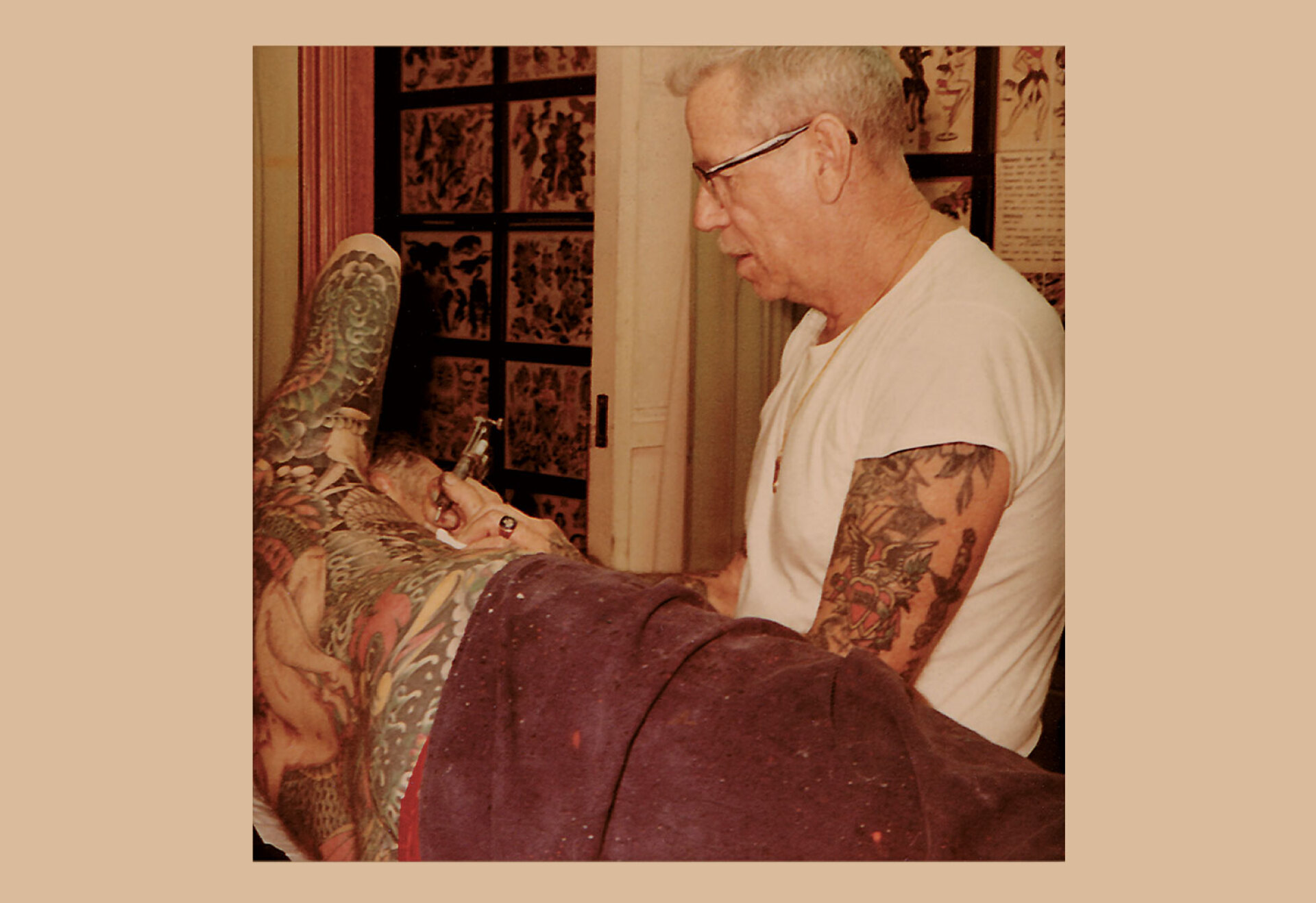 Norman Collins tattooing