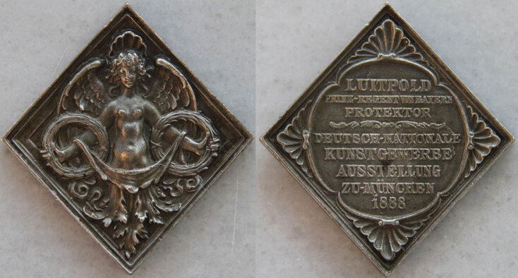 Μετάλλιο της Καλλιτεχνικής Έκθεσης του Μονάχου, το 1888, που πήραν μέρος ο Ν.Γύζης και Γ.Ιακωβίδης. Από το Αρχείο Νεοελληνικής Τέχνης.