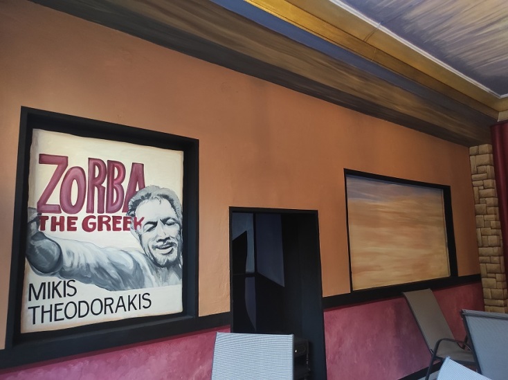 Τοιχογραφία από την ταινία «Αλέξης Ζορμπάς» του 1964, με μουσική του Μίκη Θεοδωράκη.