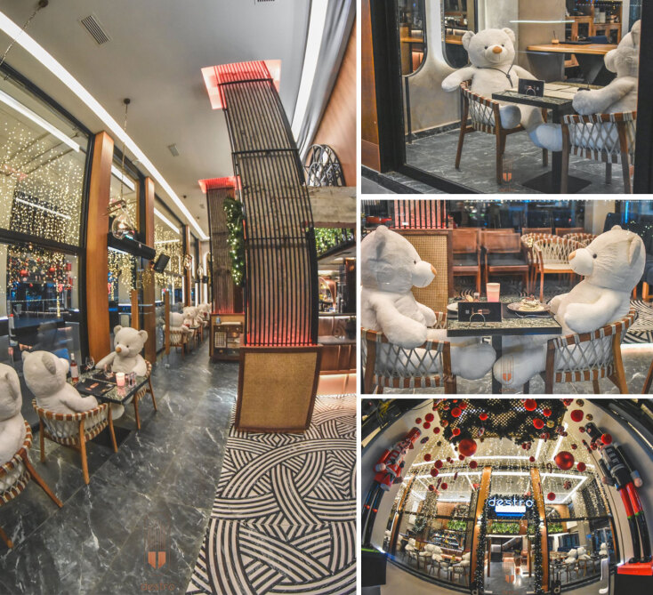 Λούτρινοι αρκούδοι στις καρέκλες καφετέριας στο κέντρο της Καρδίτσας