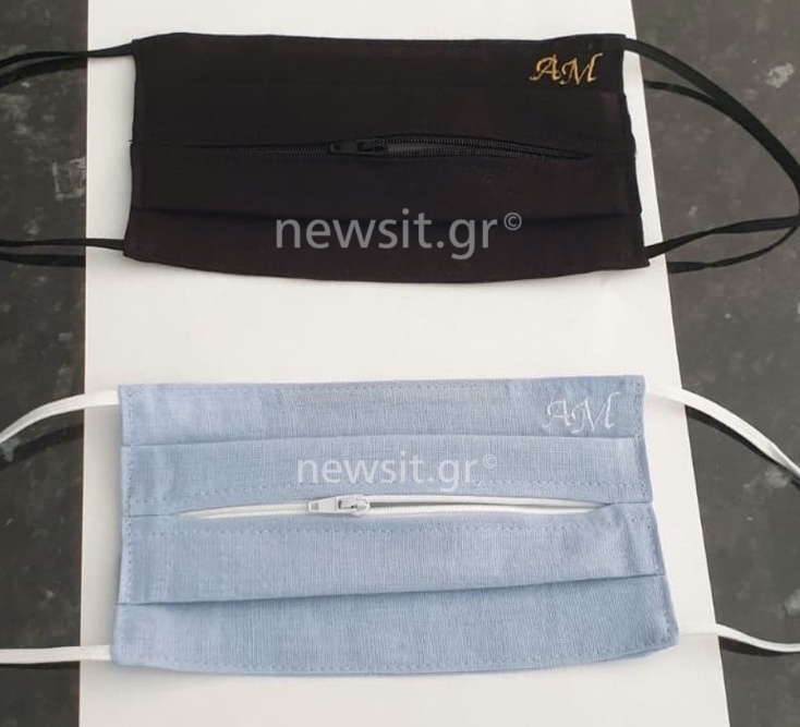 Οι δύο «zipmask» με τα αρχικά της Άνγκελα Μέρκελ