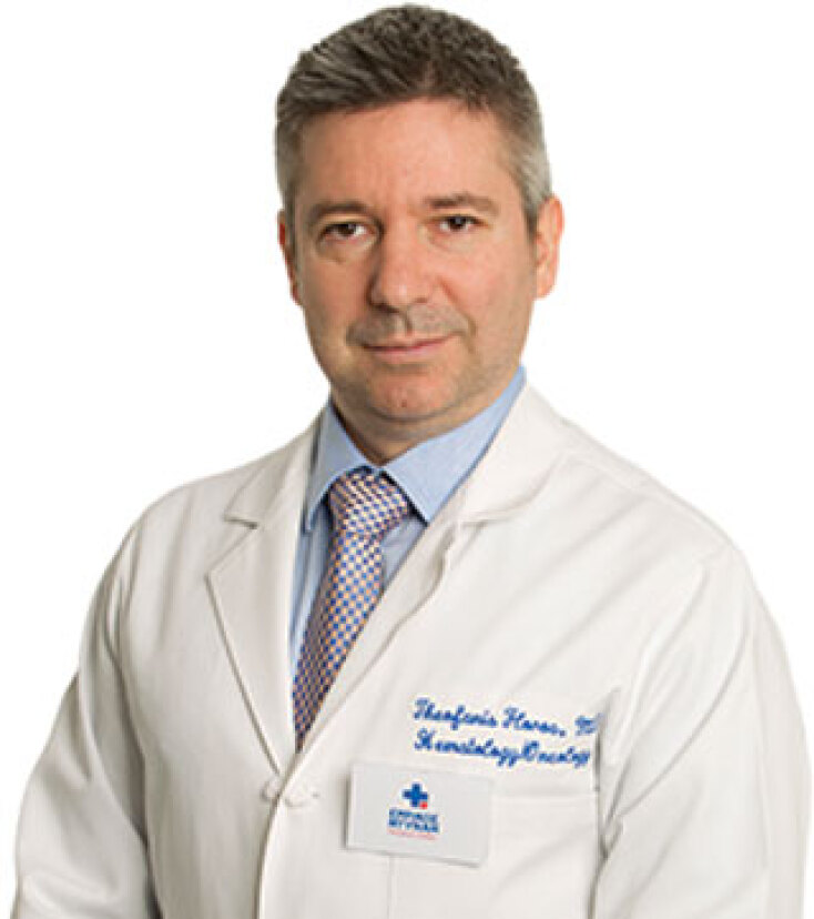 Θεοφάνης Ειρ. Φλώρος,  Παθολόγος Ογκολόγος -  Στρατιωτικός Ιατρός Αναπλ.  Διευθυντής Ογκολογικής  Κλινικής Ναυτικού Νοσοκομείου Αθηνών Συνεργάτης,  1η Ογκολογική Κλινική  Ερρίκος Ντυνάν