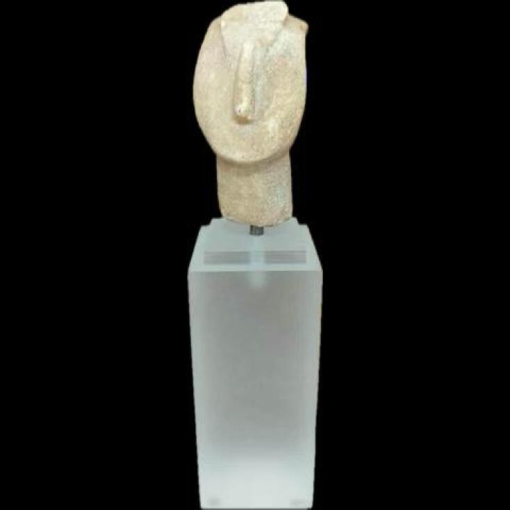 Μαρμάρινη κεφαλή Κυκλαδικού ειδωλίου.