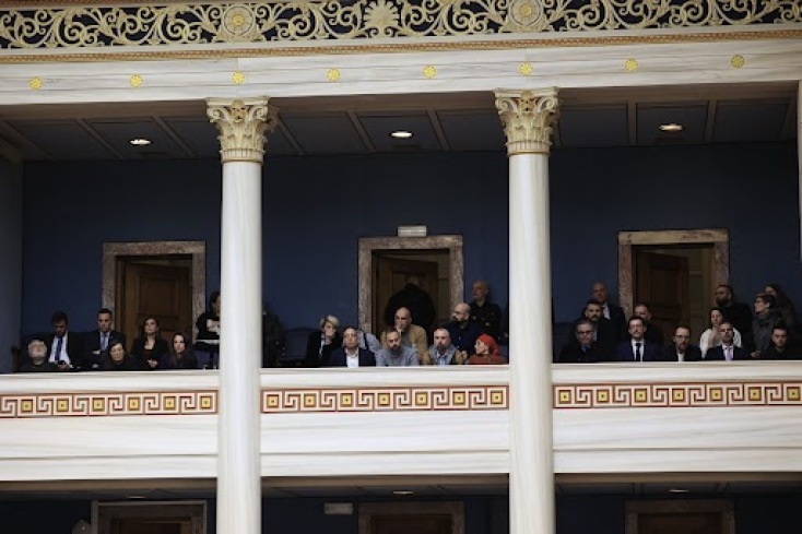 Στα θεωρεία της Βουλής Καπουτζίδης, Σεργουλόπουλος