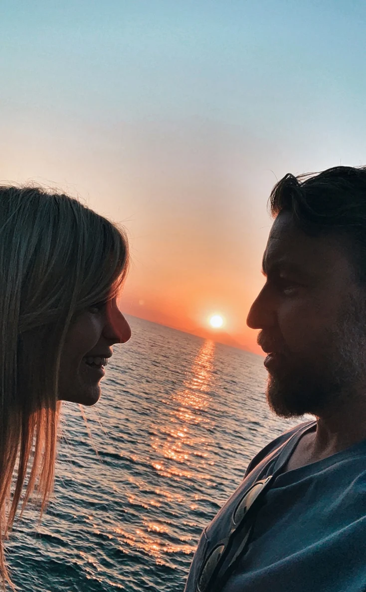 a man and woman looking at each other