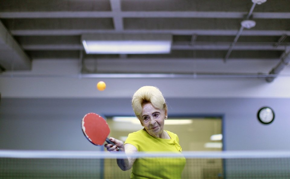 Lucy Nicholson (American/British, born England). Alzheimer’s Ping Pong Therapy, Los Angeles, CA, 2011, printed 2016. Inkjet print, 10 5/8 x 16 3/8 in. (26.9 x 41.5 cm). Courtesy of Lucy Nicholson/Reuters Lucy Nicholson (American/British, born England). Alzheimer’s Ping Pong Therapy,