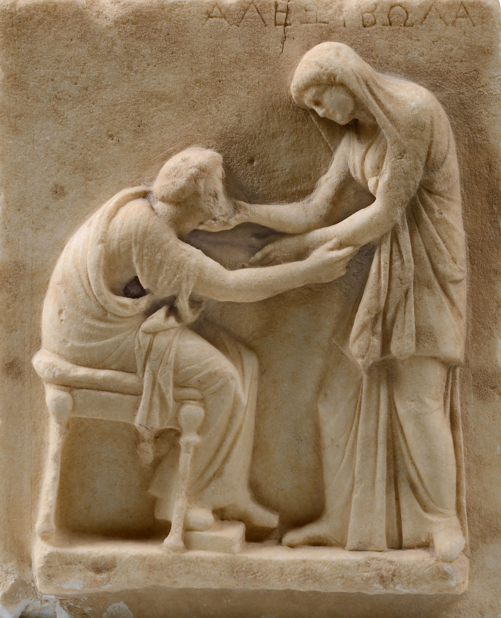 Επιτύμβια στήλη, μάρμαρο, αρχές 3ου αιώνα π.Χ., από το Νεκροταφείο της Αρχαίας Θήρας. Αρχαιολογικό Μουσείο Θήρας Επιτύμβια στήλη, μάρμαρο, αρχές 3ου αιώνα π.Χ., από το Νεκροταφείο της Αρχαίας Θήρας. Αρχαιολογικό Μουσείο Θήρας