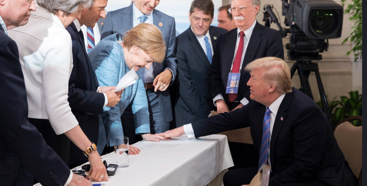 trump-merkel-g7.gif